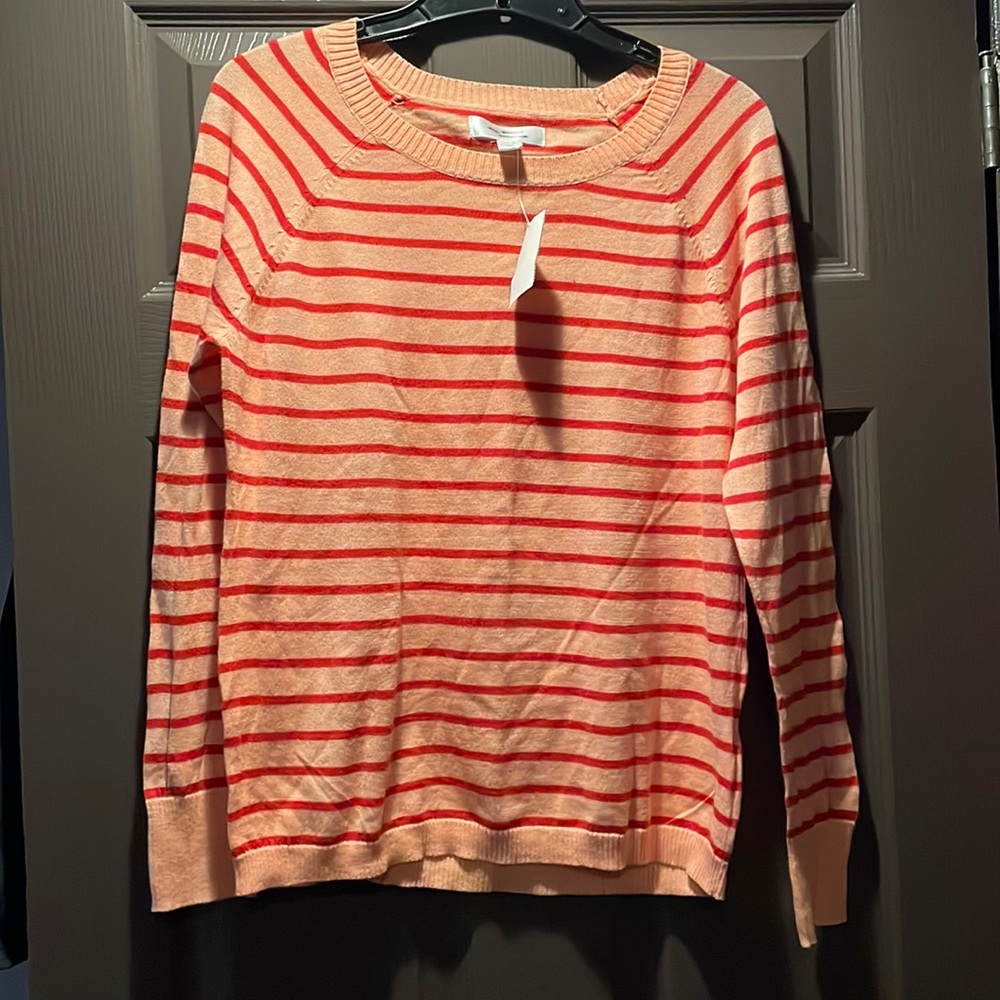 Nice orange and peach striped knit light sweater.